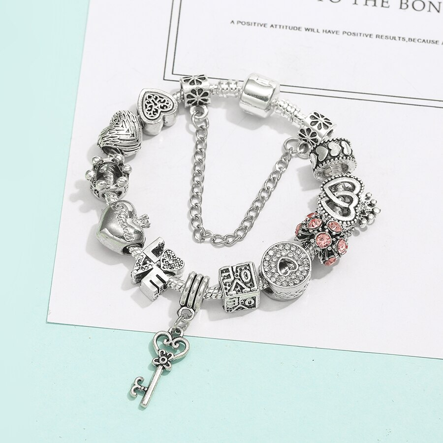 Bracciale "la chiave dell'amore" + tutti i charms inclusi