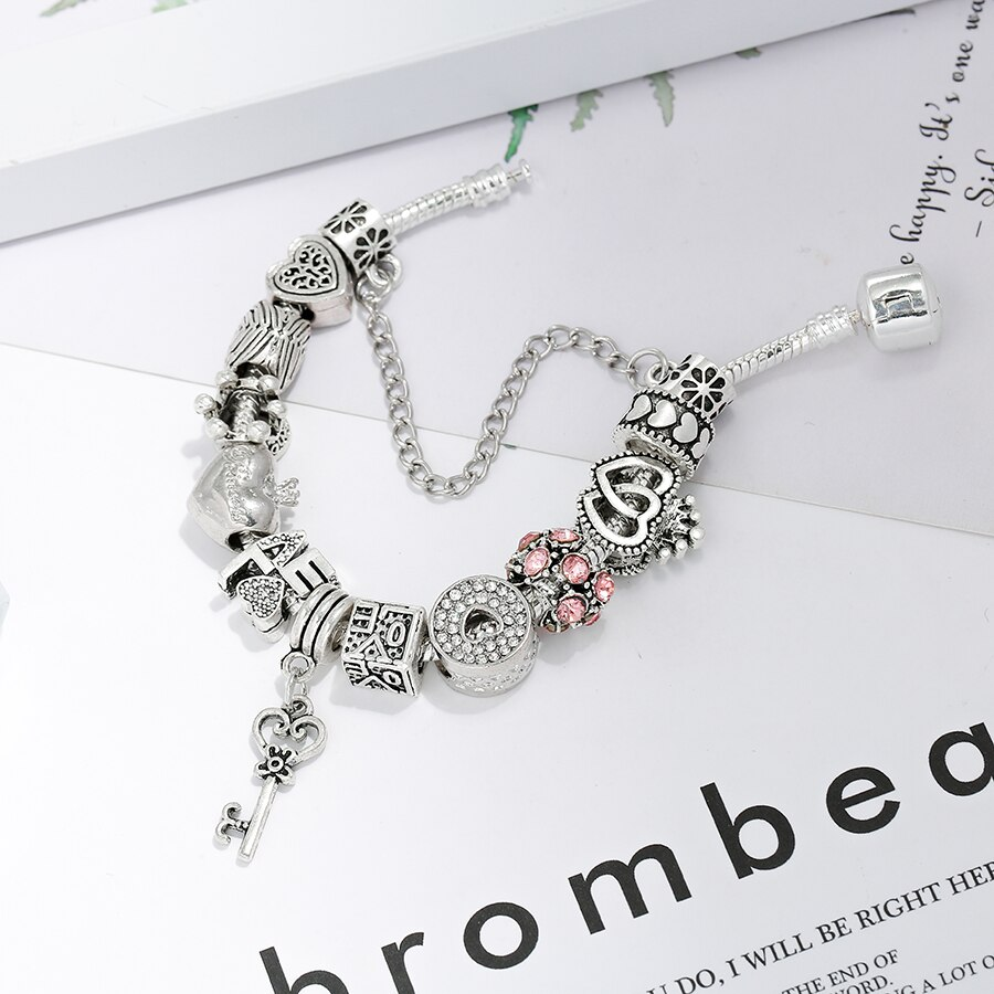 Bracciale "la chiave dell'amore" + tutti i charms inclusi